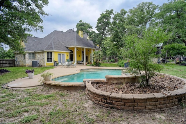 233 Maple Leaf Trl, Elgin, TX 78621 - view of swimming pool with central AC unit and a patio