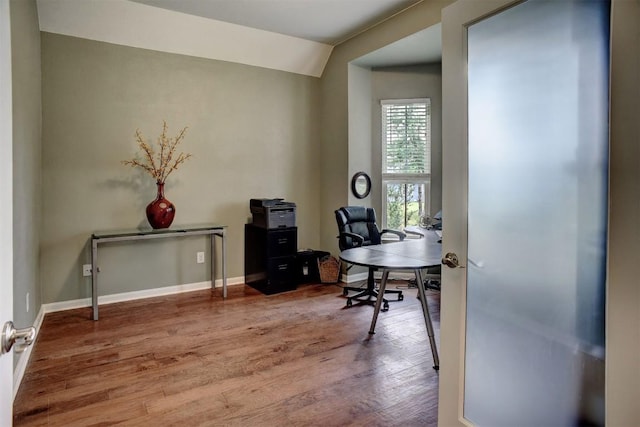 233 Maple Leaf Trl, Elgin, TX 78621 - office with wood finished floors, baseboards, and lofted ceiling