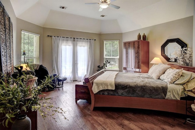 233 Maple Leaf Trl, Elgin, TX 78621 - bedroom with multiple windows, wood-type flooring, lofted ceiling, and a ceiling fan