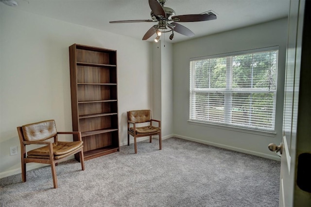 233 Maple Leaf Trl, Elgin, TX 78621 - sitting room with carpet floors, baseboards, and a ceiling fan