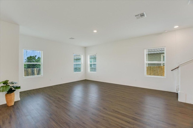 561 Greatest Gift Way, Jarrell, TX 76537 - spare room featuring dark wood-type flooring, recessed lighting, and baseboards