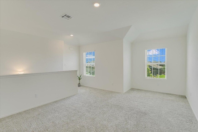 561 Greatest Gift Way, Jarrell, TX 76537 - unfurnished room with light colored carpet, recessed lighting, and baseboards