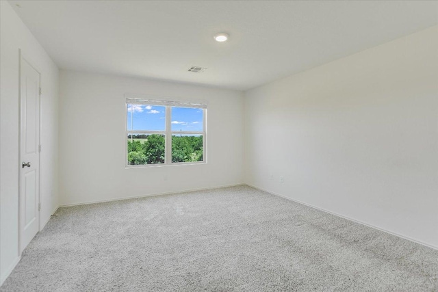 561 Greatest Gift Way, Jarrell, TX 76537 - spare room with light colored carpet and baseboards