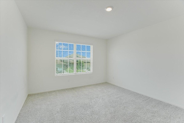 561 Greatest Gift Way, Jarrell, TX 76537 - empty room with carpet floors and baseboards