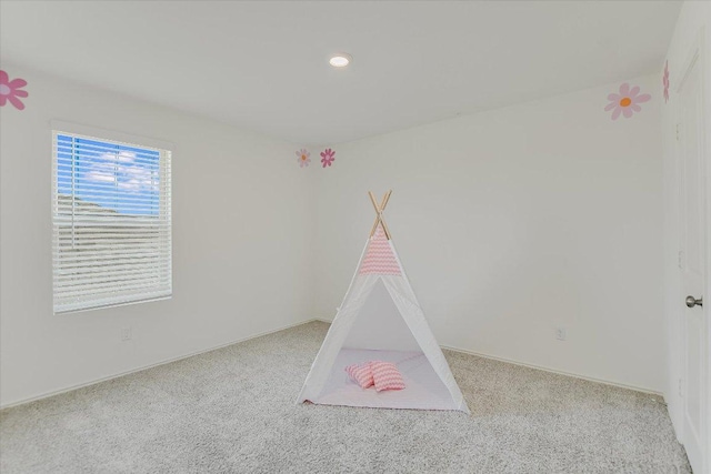 561 Greatest Gift Way, Jarrell, TX 76537 - rec room with carpet and recessed lighting