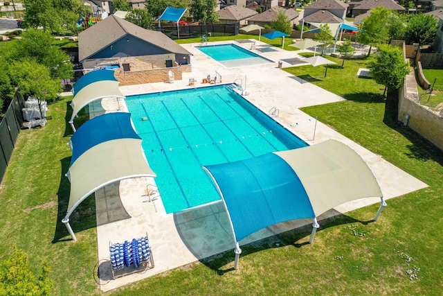 561 Greatest Gift Way, Jarrell, TX 76537 - community pool featuring a patio