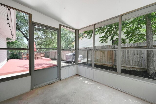 7607 Whispering Winds Dr, Austin, TX 78745 - unfurnished sunroom with vaulted ceiling