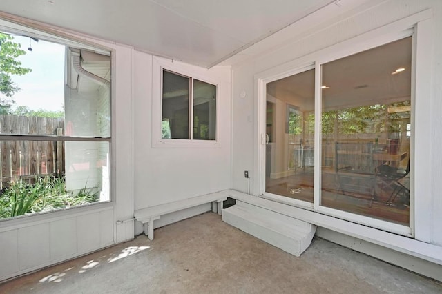 7607 Whispering Winds Dr, Austin, TX 78745 - unfurnished sunroom with concrete flooring