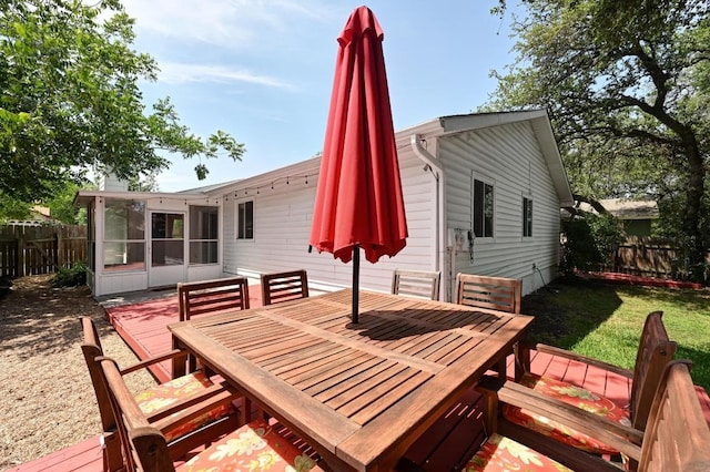 7607 Whispering Winds Dr, Austin, TX 78745 - wooden terrace featuring a sunroom and outdoor dining area