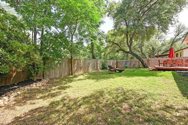 7607 Whispering Winds Dr, Austin, TX 78745 - view of yard featuring a wooden deck