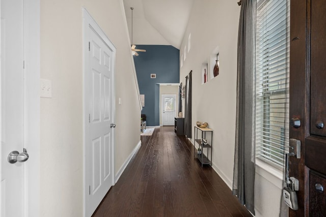 2101 Rivers Edge Way Unit 9, Austin, TX 78741 - hallway with baseboards, dark wood-type flooring, and high vaulted ceiling