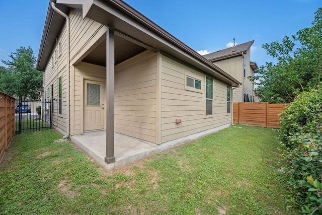 2101 Rivers Edge Way Unit 9, Austin, TX 78741 - view of side of home featuring a patio