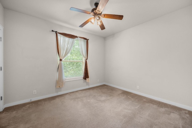 2101 Rivers Edge Way Unit 9, Austin, TX 78741 - carpeted empty room featuring a ceiling fan and baseboards