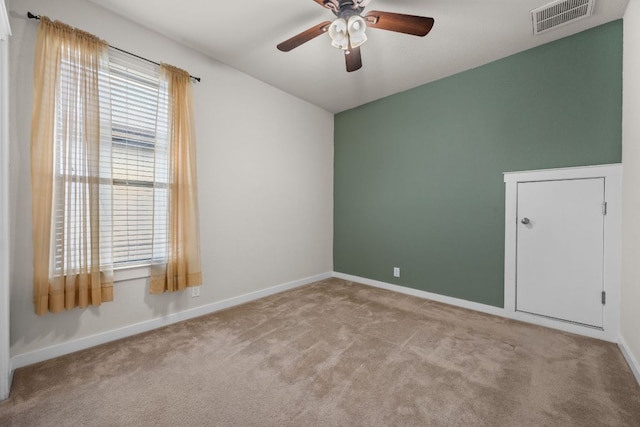 2101 Rivers Edge Way Unit 9, Austin, TX 78741 - unfurnished room featuring ceiling fan, carpet floors, and baseboards