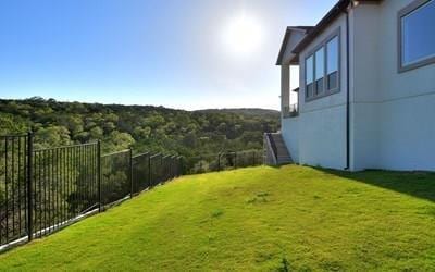 4720 Napoli Shore Dr, Leander, TX 78641 - view of yard featuring a forest view