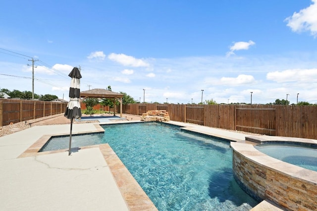 7109 Bargello Pl, Round Rock, TX 78665 - view of swimming pool featuring a gazebo, a fenced backyard, a patio, and a pool with connected hot tub