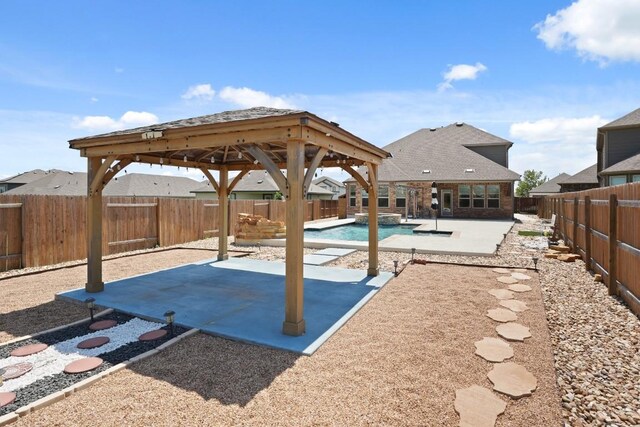 7109 Bargello Pl, Round Rock, TX 78665 - view of swimming pool featuring a gazebo, a patio area, a pool with connected hot tub, and a fenced backyard