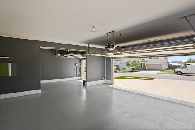 7109 Bargello Pl, Round Rock, TX 78665 - garage with a garage door opener and baseboards