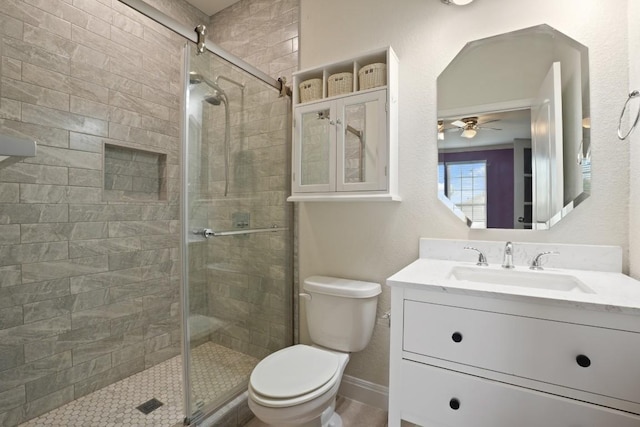 7109 Bargello Pl, Round Rock, TX 78665 - full bath with toilet, a shower stall, vanity, and ceiling fan