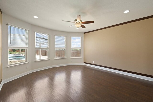 7109 Bargello Pl, Round Rock, TX 78665 - spare room with ceiling fan, healthy amount of natural light, dark wood-style floors, and recessed lighting