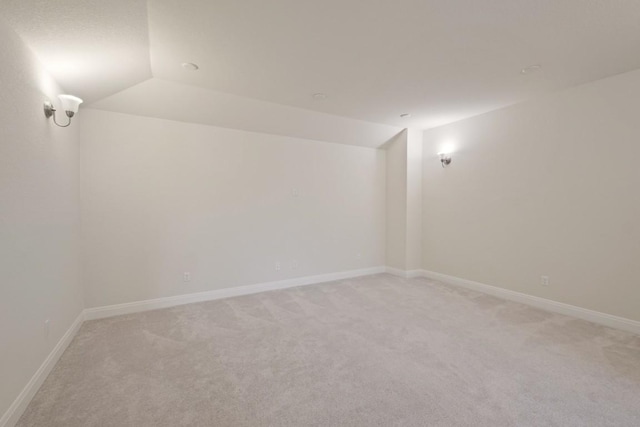 7109 Bargello Pl, Round Rock, TX 78665 - bonus room with light carpet, lofted ceiling, and baseboards