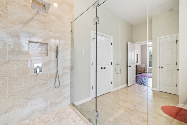 10129 Brimfield Dr, Austin, TX 78726 - bathroom featuring walk in shower and a closet