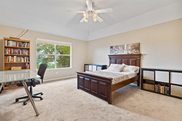 10129 Brimfield Dr, Austin, TX 78726 - bedroom featuring light colored carpet, a desk, baseboards, and a ceiling fan