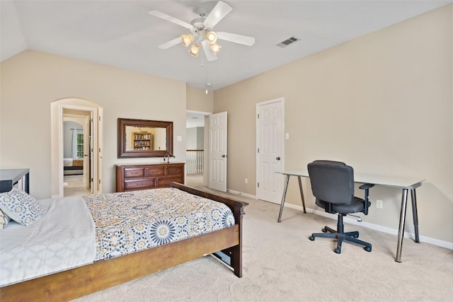 10129 Brimfield Dr, Austin, TX 78726 - bedroom with carpet floors, arched walkways, baseboards, lofted ceiling, and a ceiling fan