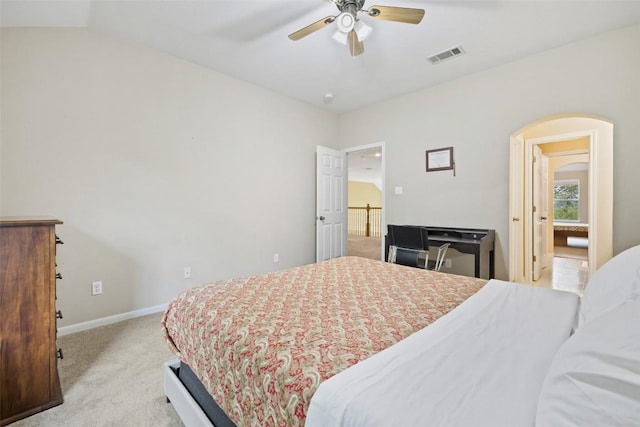 10129 Brimfield Dr, Austin, TX 78726 - bedroom with carpet, baseboards, arched walkways, ceiling fan, and lofted ceiling