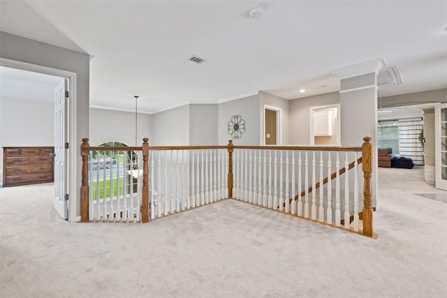 10129 Brimfield Dr, Austin, TX 78726 - corridor with carpet flooring, ornamental molding, and an upstairs landing
