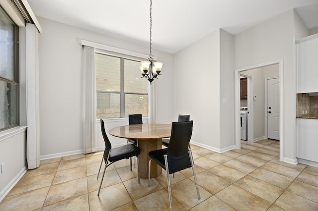 12404 Montclair Bnd, Austin, TX 78732 - dining space featuring a chandelier, washer / clothes dryer, and baseboards