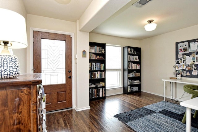 510 W Metcalfe St, Hutto, TX 78634 - foyer with wood finished floors and baseboards