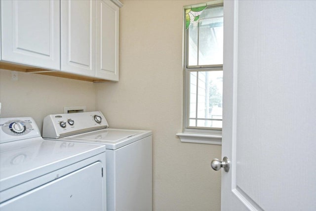 510 W Metcalfe St, Hutto, TX 78634 - laundry room featuring separate washer and dryer and cabinet space