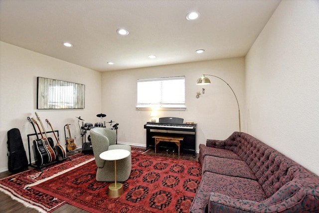 510 W Metcalfe St, Hutto, TX 78634 - living room with wood finished floors, recessed lighting, and baseboards