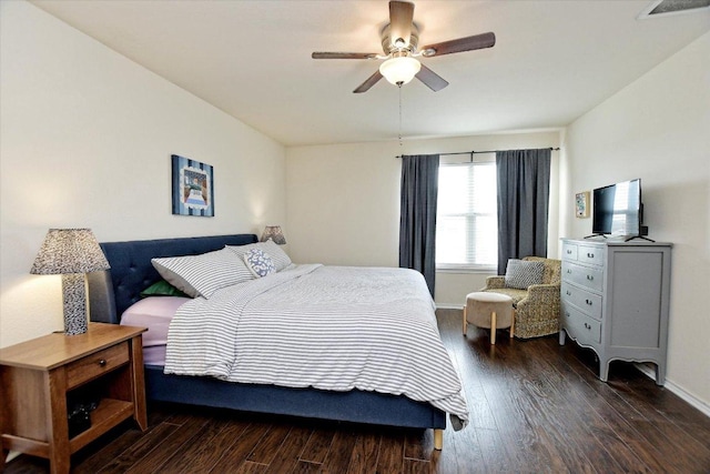 510 W Metcalfe St, Hutto, TX 78634 - bedroom featuring wood finished floors, ceiling fan, and baseboards