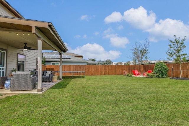 510 W Metcalfe St, Hutto, TX 78634 - view of yard with an outdoor living space, ceiling fan, a trampoline, and a patio