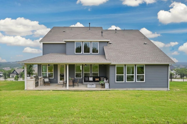 467 Cortaro Dr, Dripping Springs, TX 78620 - rear view of house with a patio area, a yard, and a shingled roof