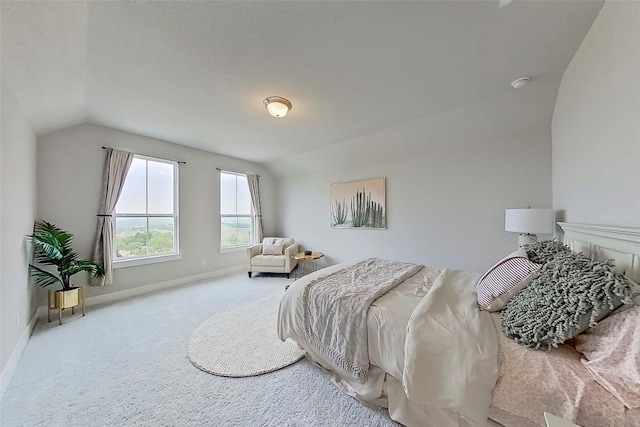 467 Cortaro Dr, Dripping Springs, TX 78620 - carpeted bedroom featuring vaulted ceiling and baseboards