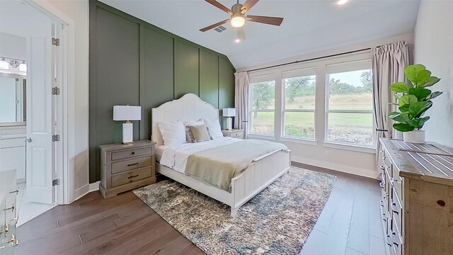 467 Cortaro Dr, Dripping Springs, TX 78620 - bedroom with wood finished floors, vaulted ceiling, baseboards, a ceiling fan, and recessed lighting