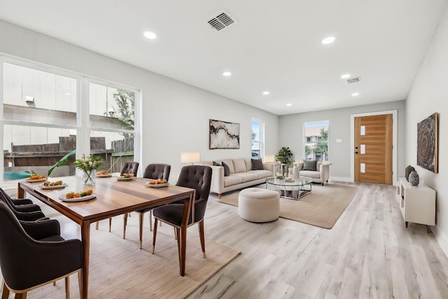 8804 Ravello Pass, Austin, TX 78749 - dining room featuring light wood-style flooring and recessed lighting