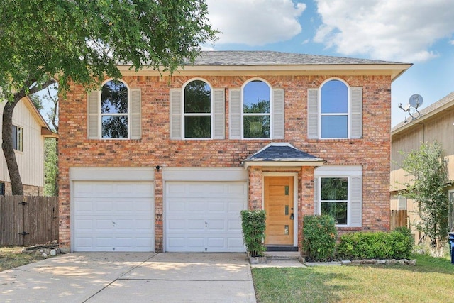 8804 Ravello Pass, Austin, TX 78749 - view of front of house featuring concrete driveway, a garage, and brick siding