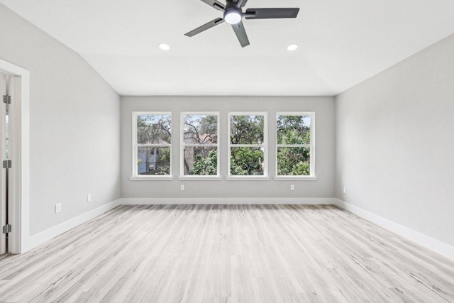 8804 Ravello Pass, Austin, TX 78749 - spare room with healthy amount of natural light, light wood-type flooring, ceiling fan, recessed lighting, and vaulted ceiling