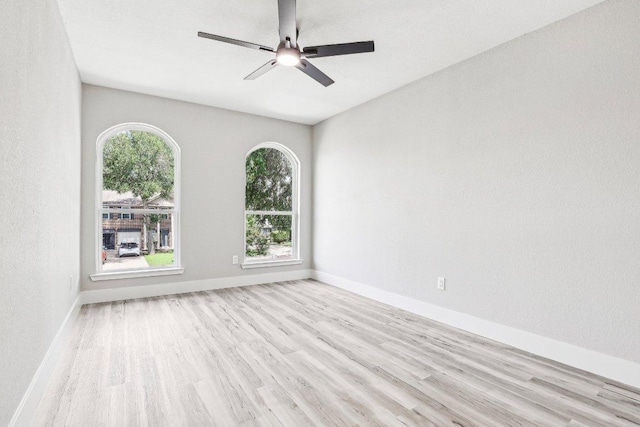 8804 Ravello Pass, Austin, TX 78749 - unfurnished room featuring wood finished floors, baseboards, and ceiling fan