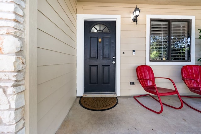 6807 Bill Hughes Rd, Austin, TX 78745 - doorway to property featuring a porch