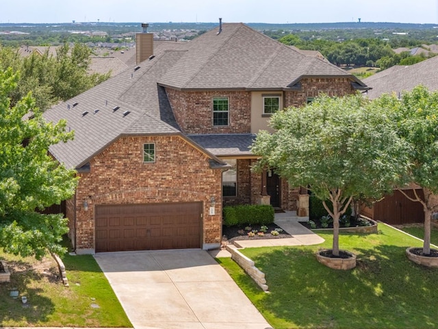 108 Brantley Lake Ln, Georgetown, TX 78628 - view of front of property featuring a shingled roof, an attached garage, brick siding, and driveway
