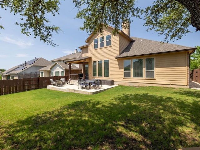 108 Brantley Lake Ln, Georgetown, TX 78628 - rear view of property featuring a chimney, a patio, and roof with shingles