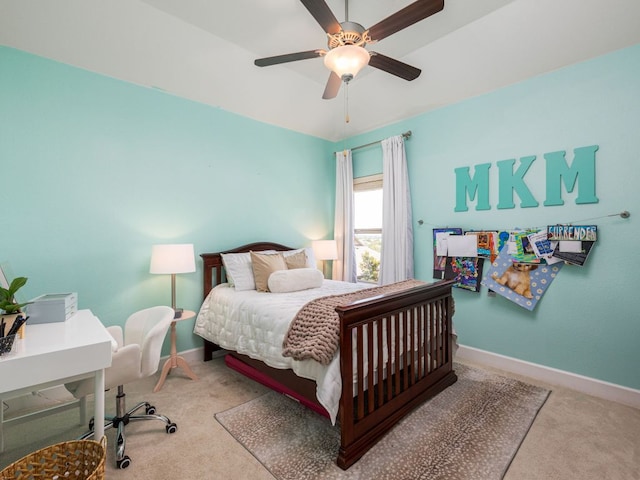 108 Brantley Lake Ln, Georgetown, TX 78628 - carpeted bedroom with baseboards and a ceiling fan