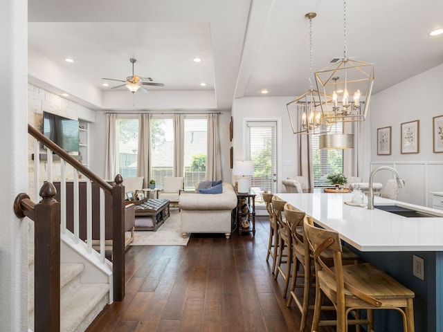 108 Brantley Lake Ln, Georgetown, TX 78628 - dining space featuring healthy amount of natural light, ceiling fan, a chandelier, stairs, and recessed lighting