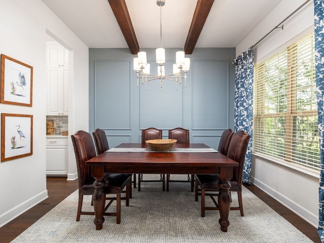 108 Brantley Lake Ln, Georgetown, TX 78628 - dining room with plenty of natural light, a chandelier, baseboards, beamed ceiling, and dark wood-style flooring