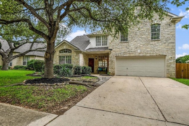 2012 Wood Glen Dr, Round Rock, TX 78681 - traditional home with stone siding, driveway, and an attached garage